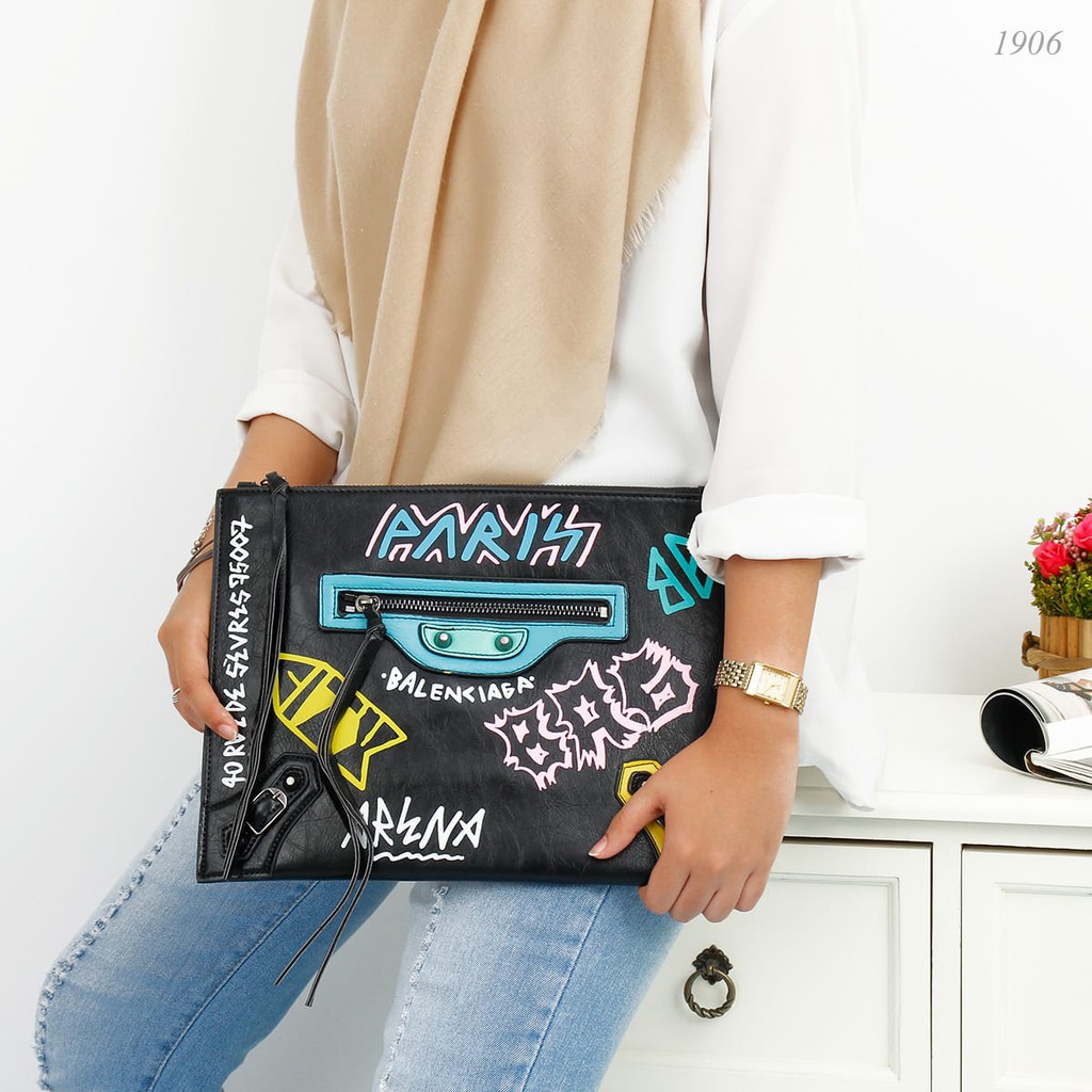 Balenciaga store clutch graffiti