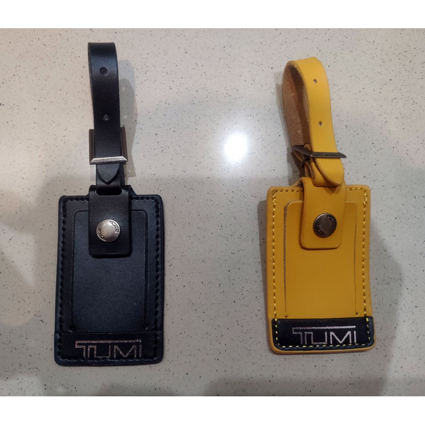 Tumi name outlet plate