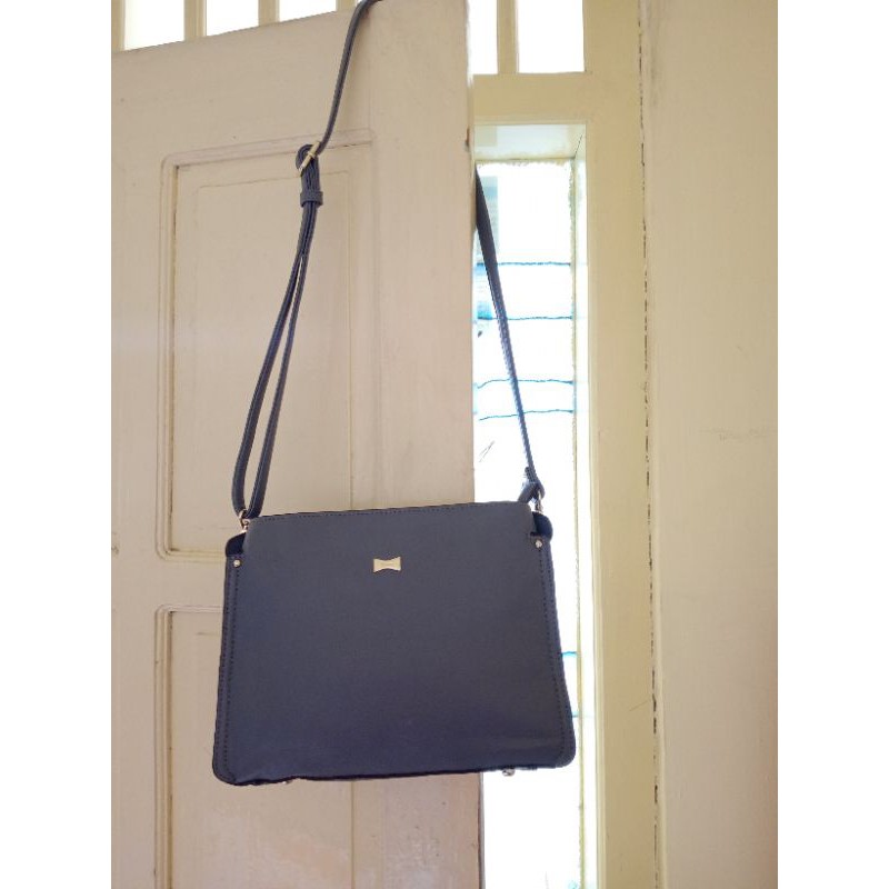 Elegance sling outlet bags