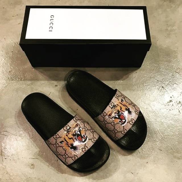 Gucci best sale tiger sandals