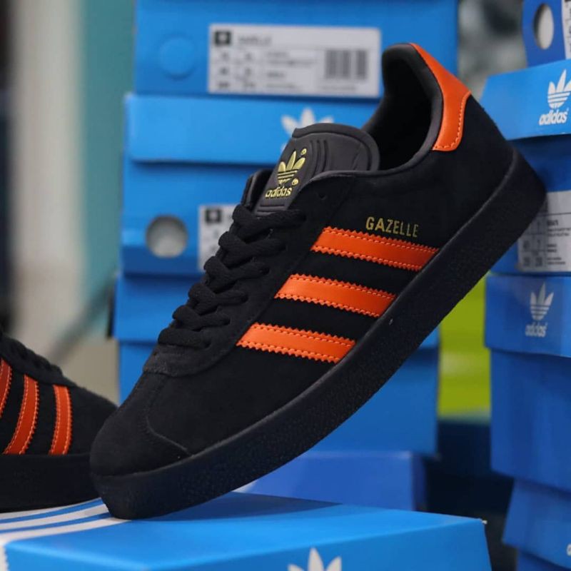 Adidas gazelle best sale orange and black