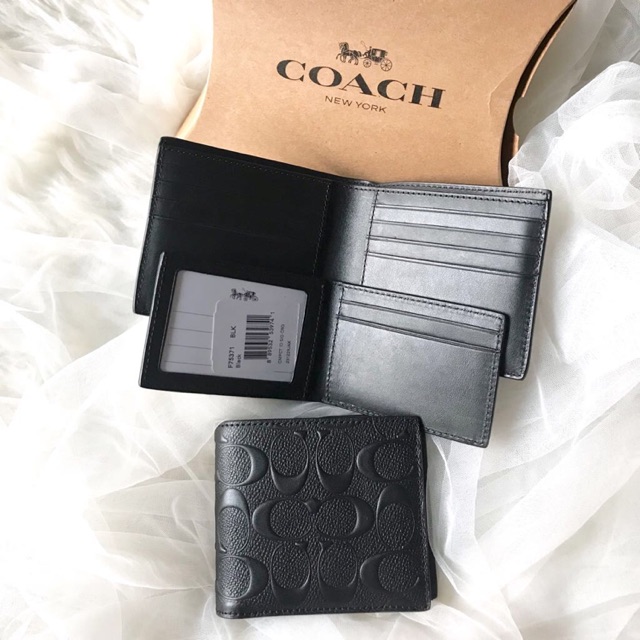 Embossed discount coach wallet