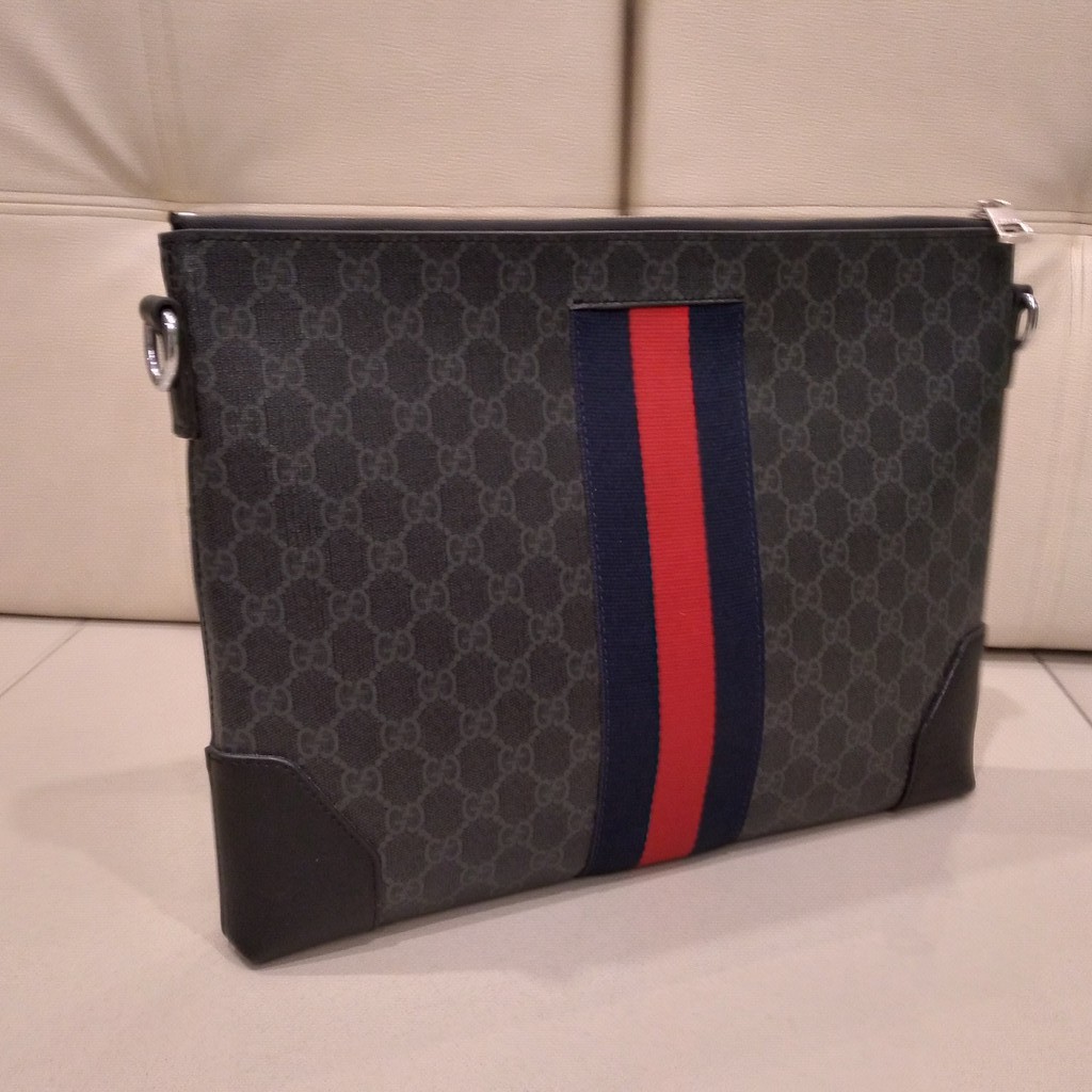 Gucci discount man clutch