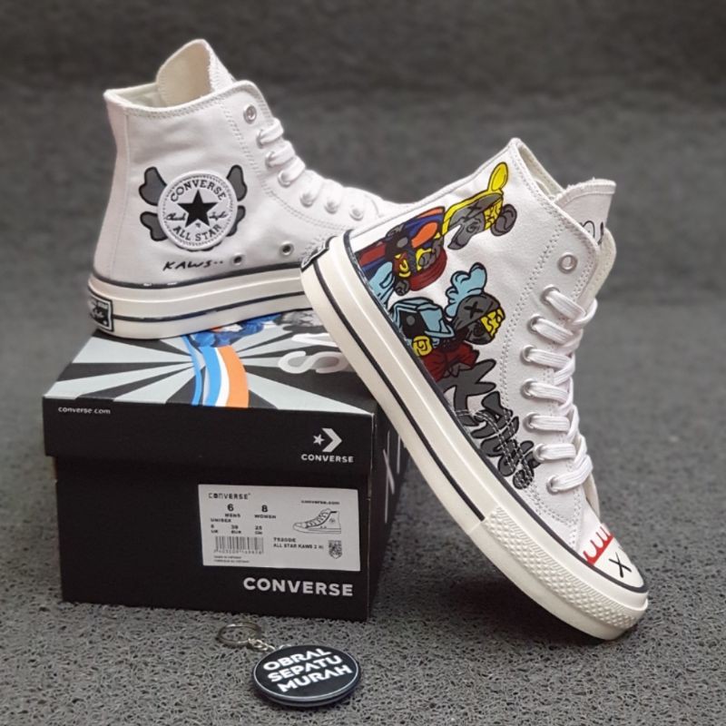 Kaws converse deals