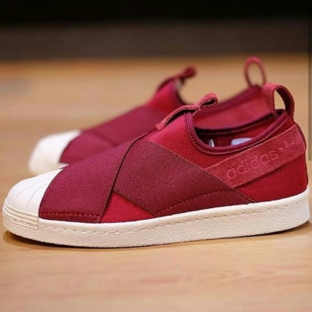 Adidas slip shop on red